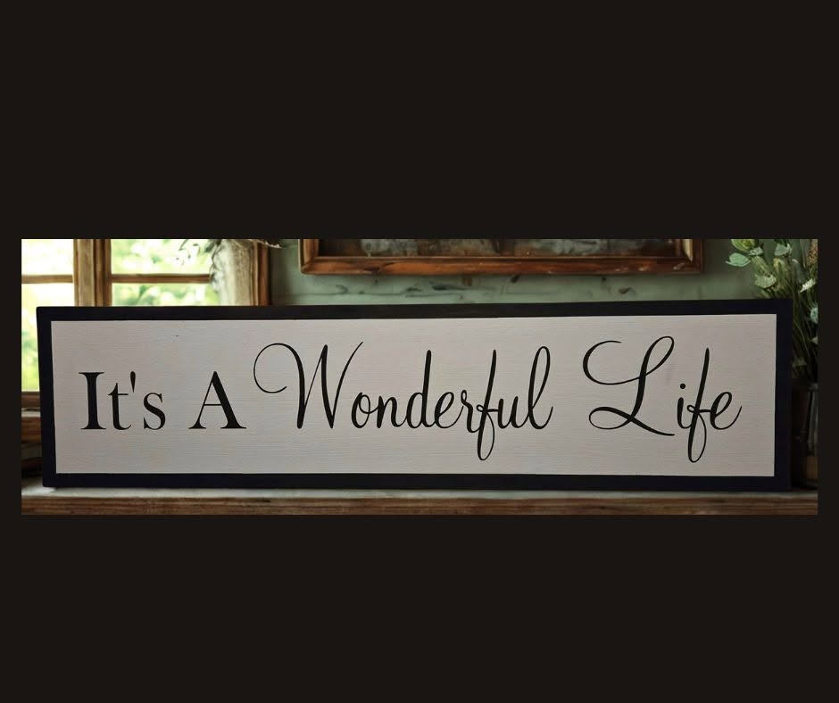 It's A Wonderful Life sign on cream pine with dark border