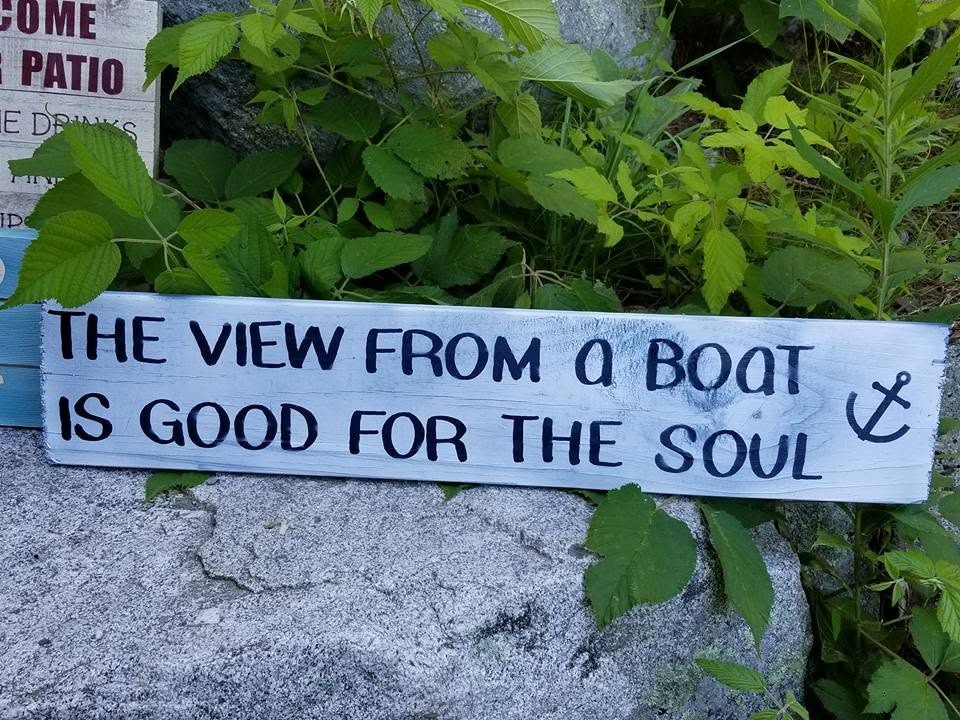The View from a Boat is Good for the Soul sign on white distressed pine with anchor