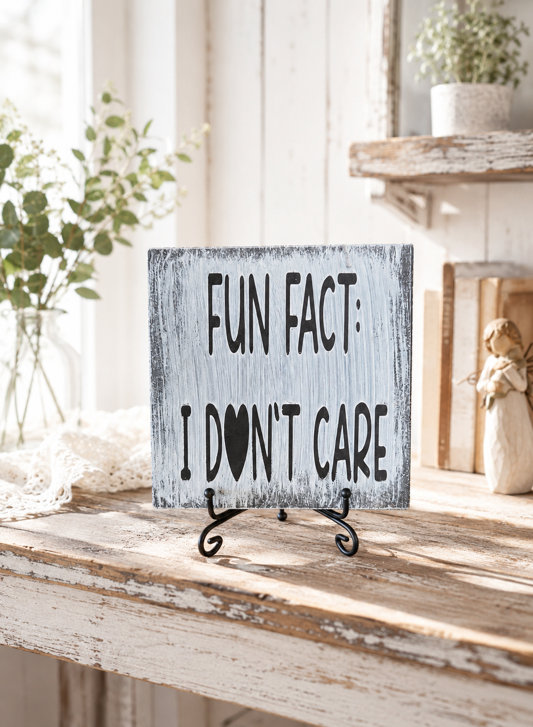 Fun Fact I Don't Care sign on distressed gray pine