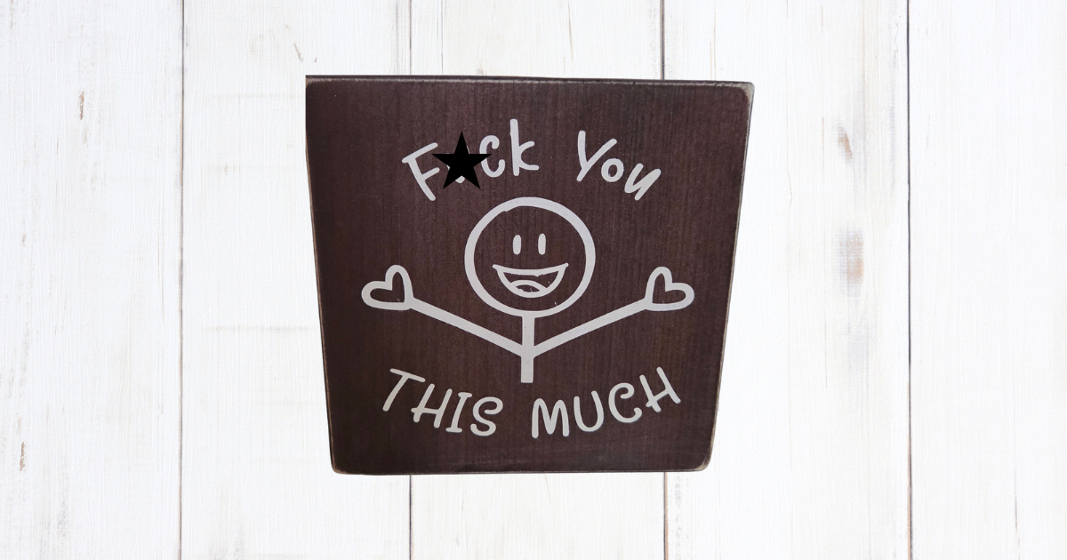 F*ck You This Much sign on dark brown pine with smiley face