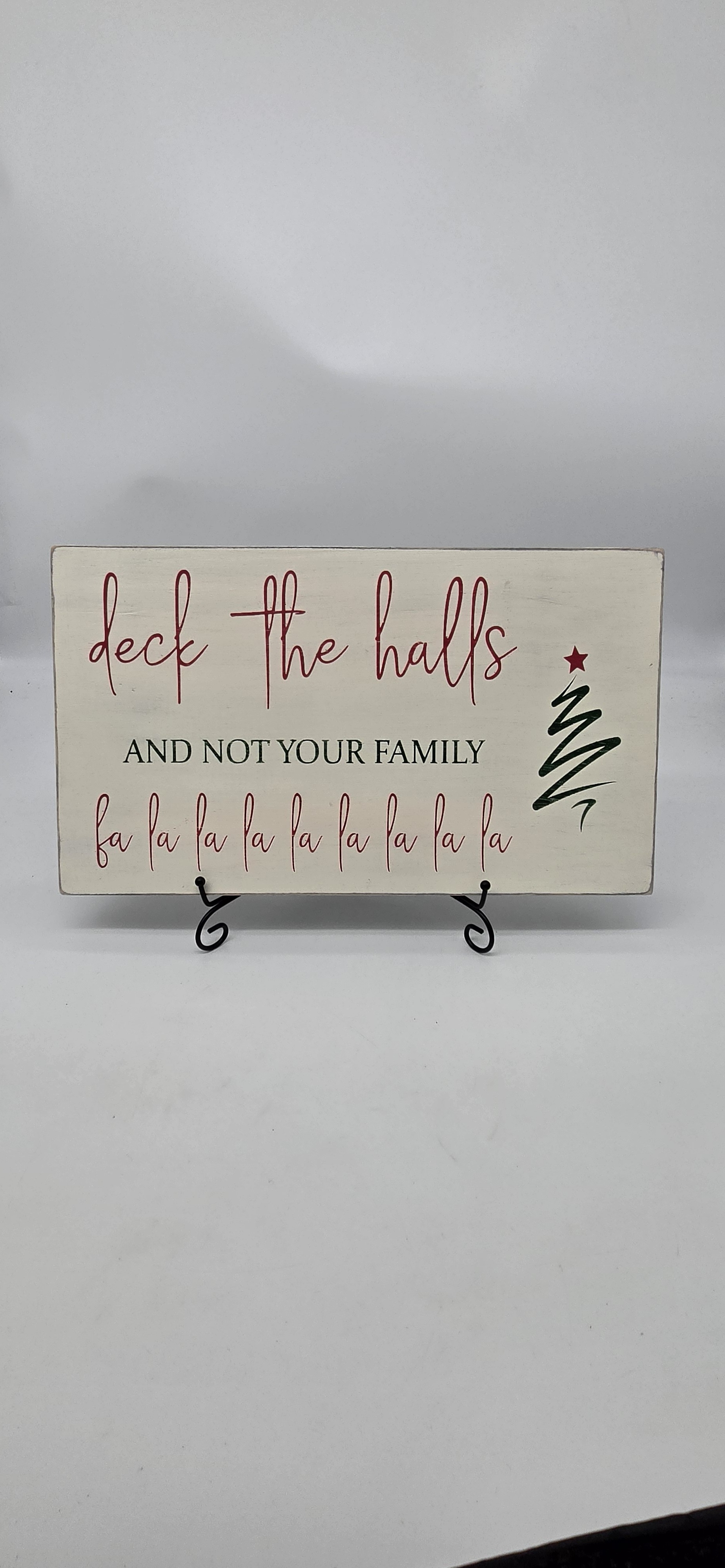 Deck the Halls and Not Your Family sign