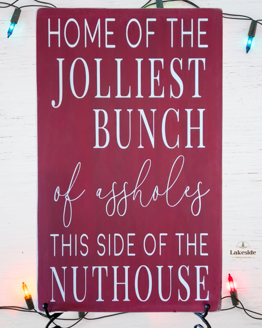 Home of the Jolliest Bunch of Assholes This Side of the Nuthouse Christmas sign
